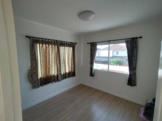 Bright and Cozy Bedroom with Ample Natural Light