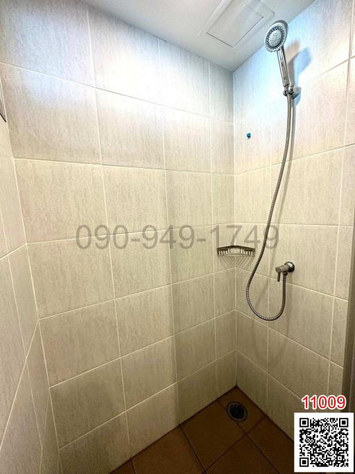 Modern tiled bathroom with shower