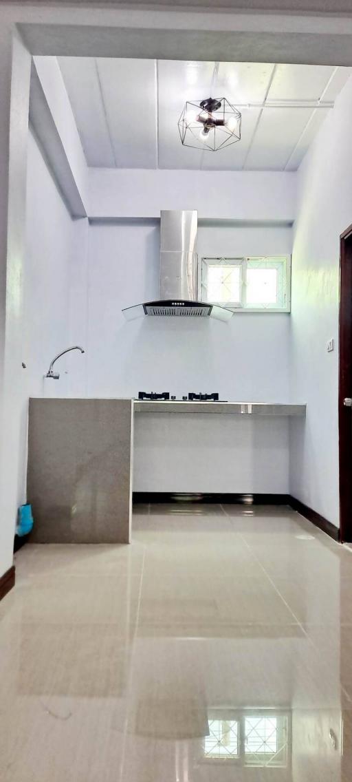 Modern kitchen with stainless steel appliances