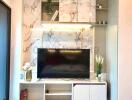 Modern living room interior with marble wall and mounted television