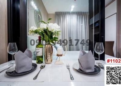 Elegant modern dining area setup with tableware