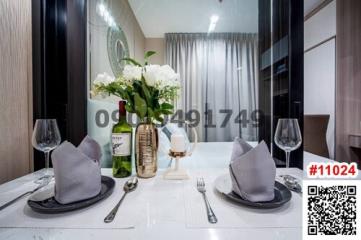 Elegant modern dining area setup with tableware