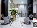 Elegant modern dining area setup with tableware