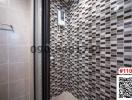 Modern tiled bathroom with glass shower cabin