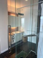 Modern bathroom with glass shower enclosure and sleek design