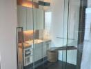 Modern bathroom with glass shower enclosure and sleek design