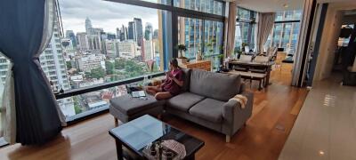 Modern living room with city view and natural light