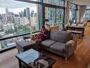 Modern living room with city view and natural light