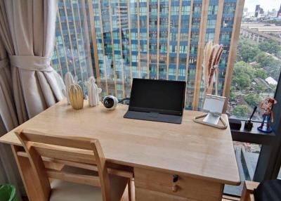 Modern home office space with a city view