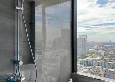 Modern bathroom with cityscape view