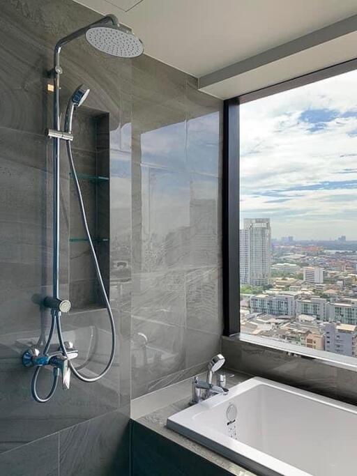 Modern bathroom with cityscape view
