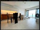 Modern kitchen with dining area and balcony access