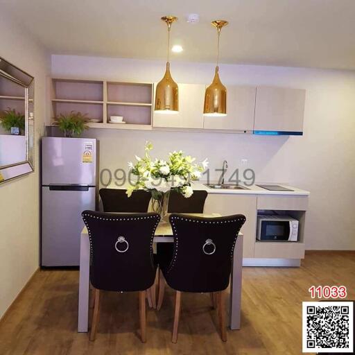 Modern kitchen with dining area and appliances