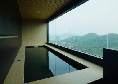 Modern indoor pool with panoramic view of the mountains