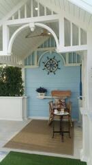 Cozy porch area with nautical theme
