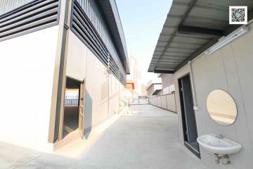 Modern residential building facade with sink outside