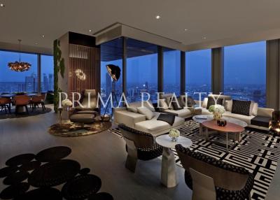 Luxurious modern living room with panoramic city views at twilight