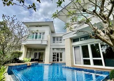 Luxury two-story house with swimming pool and garden
