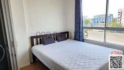 Cozy bedroom with natural light and a view