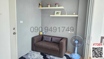 Cozy living room with sofa and decorative shelves