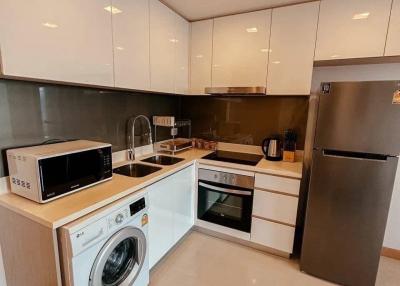 Modern kitchen with stainless steel appliances