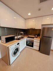 Modern kitchen with stainless steel appliances