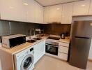 Modern kitchen with stainless steel appliances