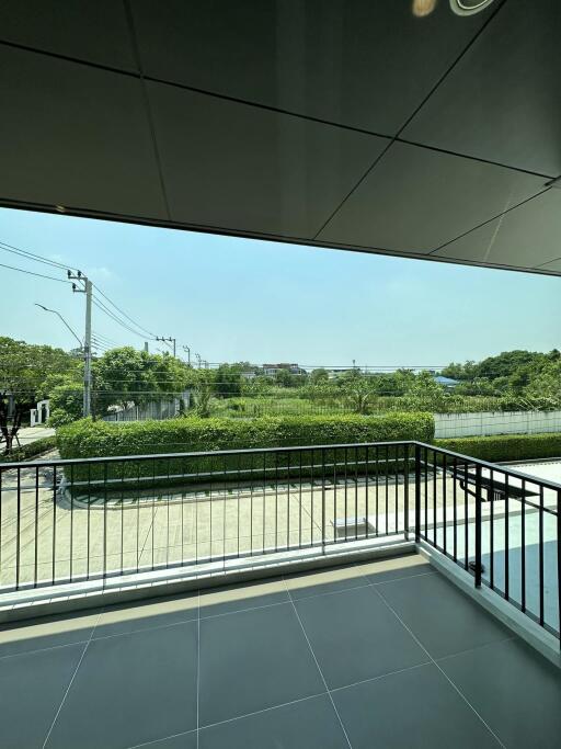 Spacious Balcony with a Serene View of Greenery