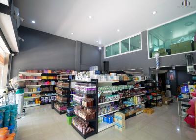 Spacious store interior with shelving stocked with products