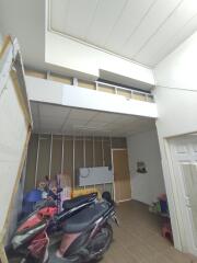 Spacious garage with a mezzanine for storage and room for vehicles