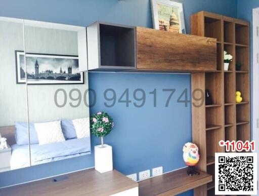 Modern living room interior with blue walls and wooden shelving