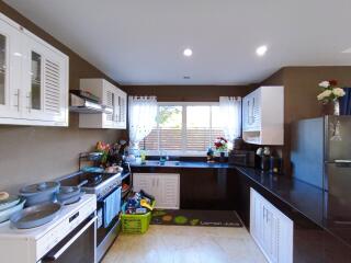 Modern spacious kitchen with ample counter space and storage