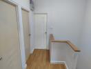 Bright hallway with wooden flooring