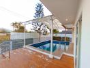 Spacious outdoor area with swimming pool and decking