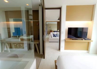 Modern bedroom with ensuite bathroom and television