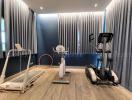 Modern Home Exercise Room with Treadmill, Exercise Bike, and Hula Hoop