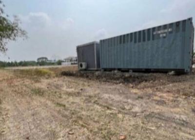 Converted shipping container on open land