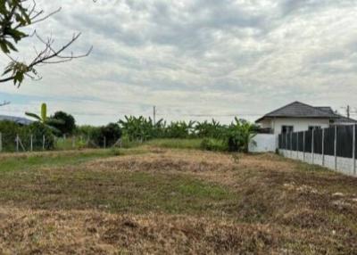 Spacious open plot of land available for construction with clear skies and fencing
