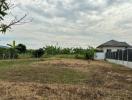 Spacious open plot of land available for construction with clear skies and fencing