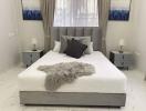 Elegant modern bedroom with double bed and stylish decor