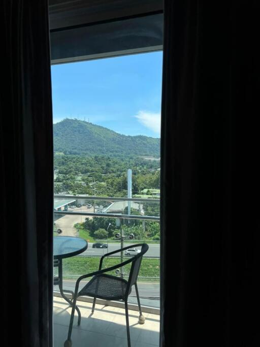 Room interior with a scenic mountain view through the window