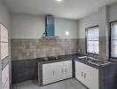 Modern kitchen with tile backsplash and natural lighting