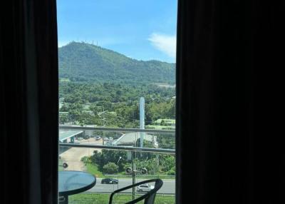 Room with a view of the mountains and natural surroundings