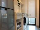 Modern kitchen with built-in appliances and ample shelving