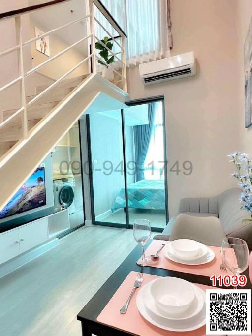 Modern loft apartment interior with mezzanine and large windows