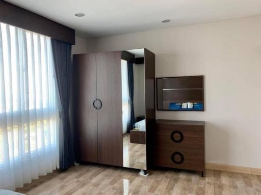 Modern bedroom with neutral color palette and natural light