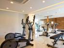 Well-equipped modern home gym with various exercise machines