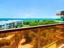 Spacious balcony with ocean view and clear blue sky
