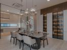 Modern dining room with open-plan kitchen and wine cellar