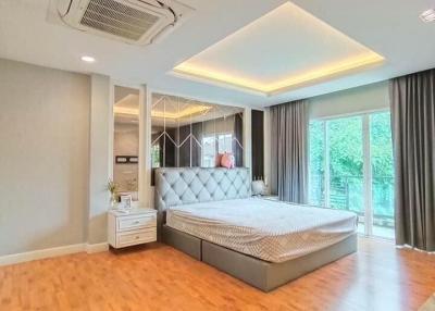 Spacious bedroom with modern design and natural light